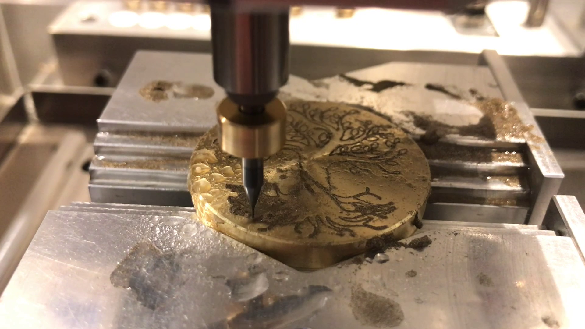 Load video: Engrave trees of life and other patterns in your jewelry with ease using the Veromill milling machine. The machine can process your drawings and templates directly from CorelDraw.  Significantly longer tool life due to the use of minimum quantity lubrication (cooling by air and spray).  Automatic insertion of the tools.